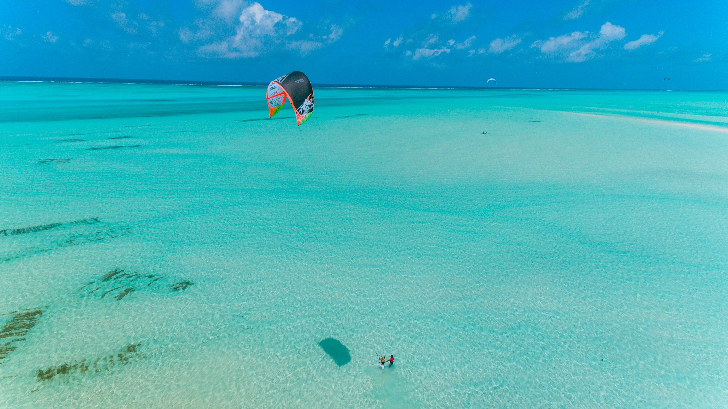 Kite surfing off the coast at Jambiani, Zanzibar